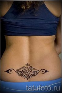 фото тату на пояснице для статьи про значение татуировок на пояснице - tatufoto.ru - 16