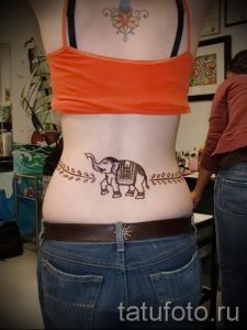 фото тату на пояснице для статьи про значение татуировок на пояснице - tatufoto.ru - 19