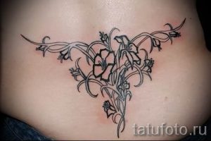 фото тату на пояснице для статьи про значение татуировок на пояснице - tatufoto.ru - 20