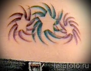 фото тату на пояснице для статьи про значение татуировок на пояснице - tatufoto.ru - 23