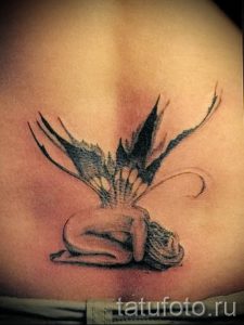 фото тату на пояснице для статьи про значение татуировок на пояснице - tatufoto.ru - 24