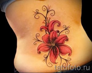 фото тату на пояснице для статьи про значение татуировок на пояснице - tatufoto.ru - 26