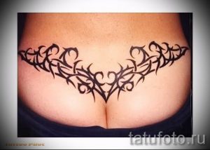 фото тату на пояснице для статьи про значение татуировок на пояснице - tatufoto.ru - 29