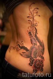 фото тату на пояснице для статьи про значение татуировок на пояснице - tatufoto.ru - 35