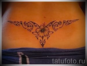 фото тату на пояснице для статьи про значение татуировок на пояснице - tatufoto.ru - 50