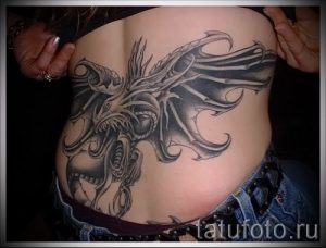 фото тату на пояснице для статьи про значение татуировок на пояснице - tatufoto.ru - 53