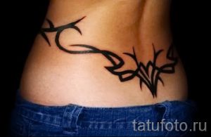 фото тату на пояснице для статьи про значение татуировок на пояснице - tatufoto.ru - 57