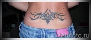 фото тату на пояснице для статьи про значение татуировок на пояснице - tatufoto.ru - 63