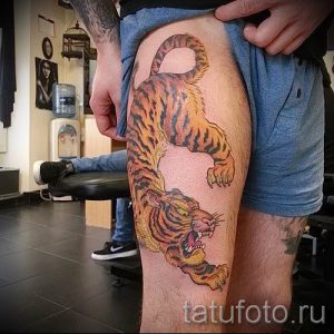 фото тату оскал тигра для статьи про значение татуировки с оскалом - tatufoto.ru - 2
