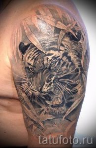 фото тату оскал тигра для статьи про значение татуировки с оскалом - tatufoto.ru - 3