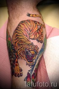 фото тату оскал тигра для статьи про значение татуировки с оскалом - tatufoto.ru - 9