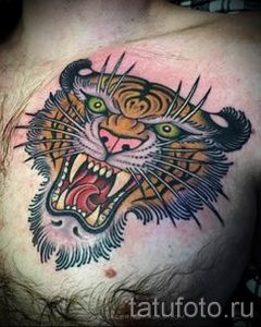 фото тату оскал тигра для статьи про значение татуировки с оскалом - tatufoto.ru - 12