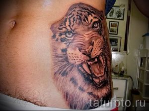 фото тату оскал тигра для статьи про значение татуировки с оскалом - tatufoto.ru - 16