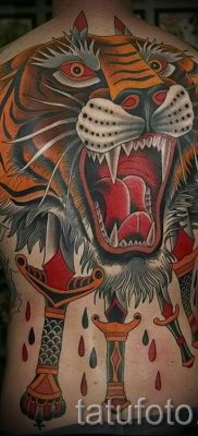 фото тату оскал тигра для статьи про значение татуировки с оскалом — tatufoto.ru — 17