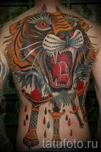 фото тату оскал тигра для статьи про значение татуировки с оскалом - tatufoto.ru - 17