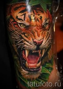 фото тату оскал тигра для статьи про значение татуировки с оскалом - tatufoto.ru - 19