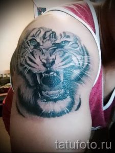 фото тату оскал тигра для статьи про значение татуировки с оскалом - tatufoto.ru - 20