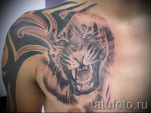 фото тату оскал тигра для статьи про значение татуировки с оскалом - tatufoto.ru - 22
