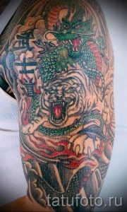 фото тату оскал тигра для статьи про значение татуировки с оскалом - tatufoto.ru - 23