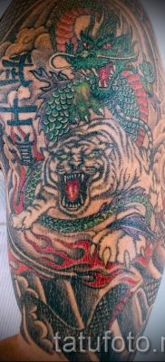 фото тату оскал тигра для статьи про значение татуировки с оскалом — tatufoto.ru — 23