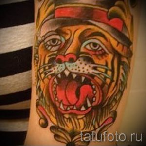 фото тату оскал тигра для статьи про значение татуировки с оскалом - tatufoto.ru - 26