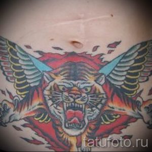 фото тату оскал тигра для статьи про значение татуировки с оскалом - tatufoto.ru - 27
