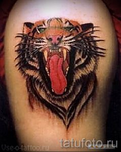 фото тату оскал тигра для статьи про значение татуировки с оскалом - tatufoto.ru - 36