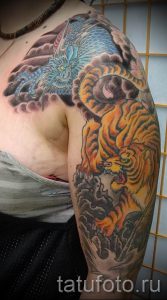 фото тату тигр и дракон для статьи про значение татуировки - tatufoto.ru - 1
