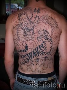 фото тату тигр и дракон для статьи про значение татуировки - tatufoto.ru - 4
