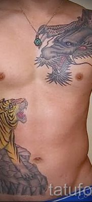 фото тату тигр и дракон для статьи про значение татуировки — tatufoto.ru — 11