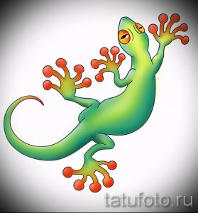 Фото тату геккона в мультяшном стиле с использованием ярких зеленых и красных цветов. Рисунок выглядит игриво и весело.