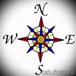 Фото тату с изображением классической розы ветров. Яркие цвета и четкие линии создают эффектный рисунок.
