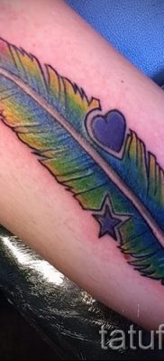 Оригинальный пример тату радуга на фото – для статьи про историю рисунка радуги в тату