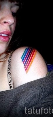 Интересный пример тату радуга на фото – для статьи про смыс рисунка радуги в тату