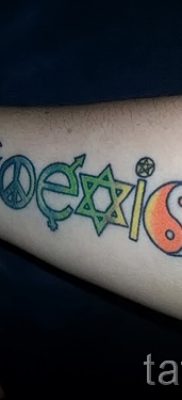 Крутой вариант наколки радуга на фото – для статьи про значение рисунка радуги в тату