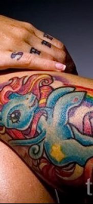 Крутой пример татуировки радуга на фото – для материала про толкование рисунка радуги в тату