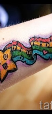 Оригинальный вариант тату радуга на фотографии – для публикации про толкование рисунка радуги в тату