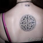 Прикольный пример выполненной тату круг – рисунок подойдет для тату спине круг