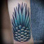 Интересный вариант нанесенной татуировки ананас – рисунок подойдет для тату ананаса на ноге