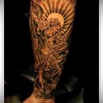Уникальный вариант нанесенной татуировки Архангел Михаил – рисунок подойдет для тату архангел михаил на боку