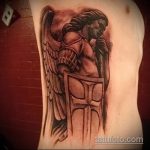 Интересный пример выполненной наколки Архангел Михаил – рисунок подойдет для архангел михаил тату на спине