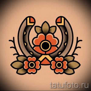 Фото тату: яркая татуировка в стиле олдскул с изображением двух подков и красных цветов. Подходит для предплечья или плеча.