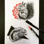 Фото тату эскиза белки с красным цветком и два черно-белых рисунка белки, рядом инструменты для татуировки.
