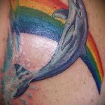 фото тату дельфин №174 - достойный вариант рисунка, который успешно можно использовать для переработки и нанесения как фото тату дельфин на копчике