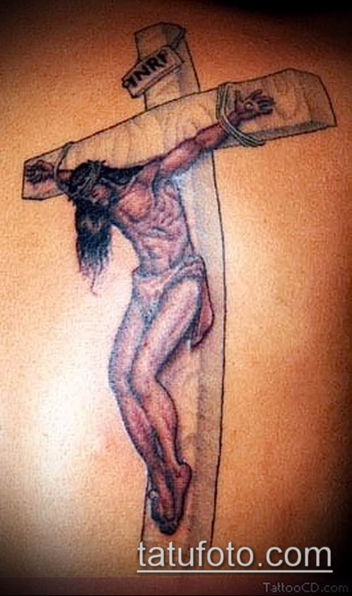 Распятие Иисуса Христа на кресте на спине