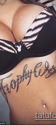 фото тату на животе (tattoo on her stomach) (значение) — пример рисунка — 004 tatufoto.com