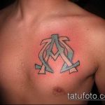 тату омега №53 - уникальный вариант рисунка, который легко можно использовать для преобразования и нанесения как tattoo omega symbol