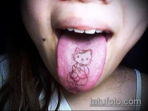 Фото пирсинга: рисунок Hello Kitty на языке. Необычный и яркий образ.