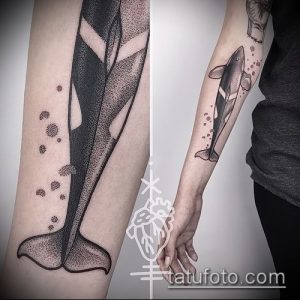 Фото тату: кит-убийца, выполненный в технике dotwork, с использованием множества точек для создания изображения, на руке.