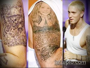 Фотография Эминема с татуировками на руках и предплечьях, включая череп, портрет девушки и рукава татуировок.